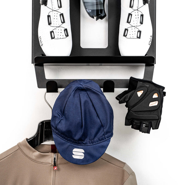 Close up of the black Stasdock Hang On, together with some cycling accessories